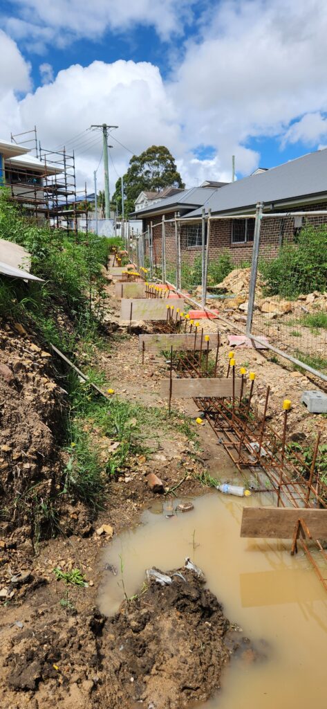 Residential sleeper retaining wall – Strive Engineering Sleeper retaining wall design for residential property in Sydney