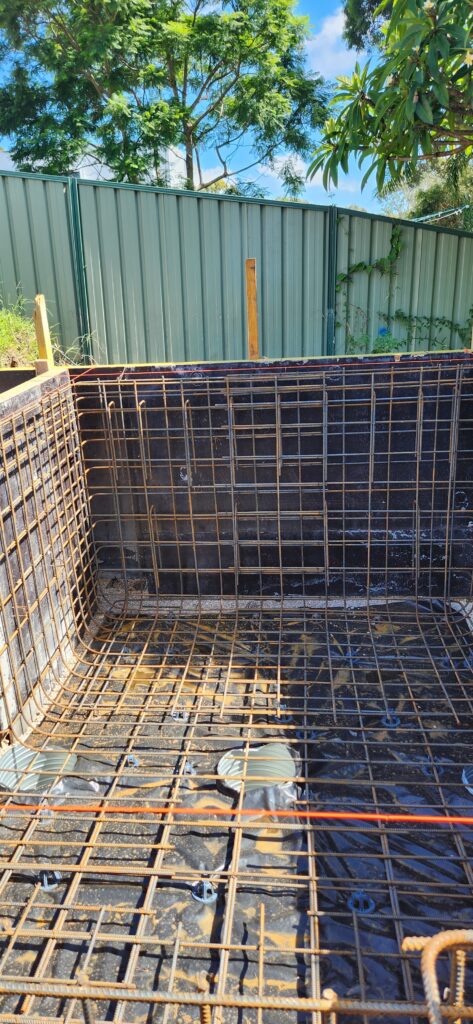 Swimming pool structural design with integrated steel wall by Strive Engineering Sydney
